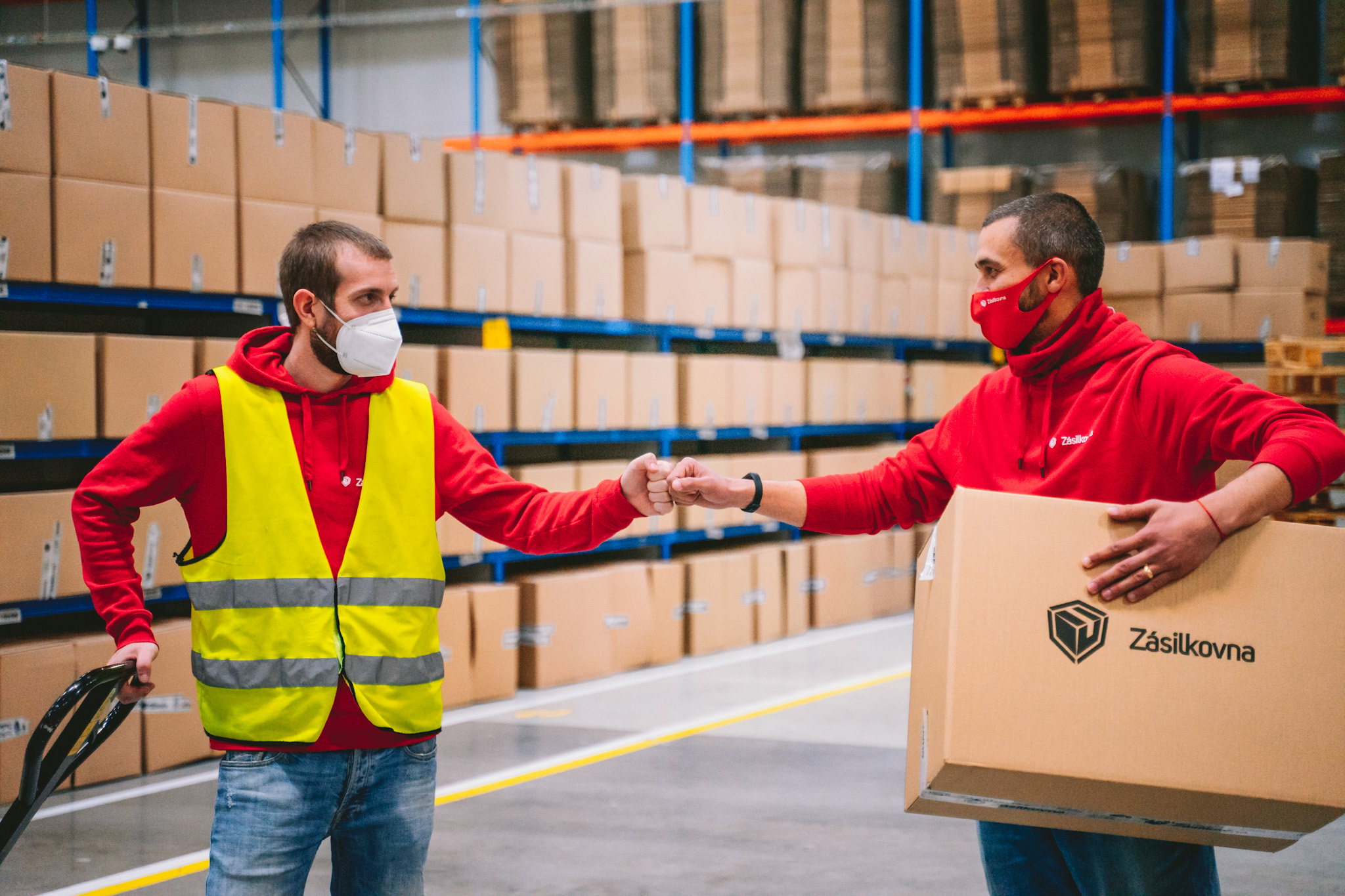 two men inside a warehouse