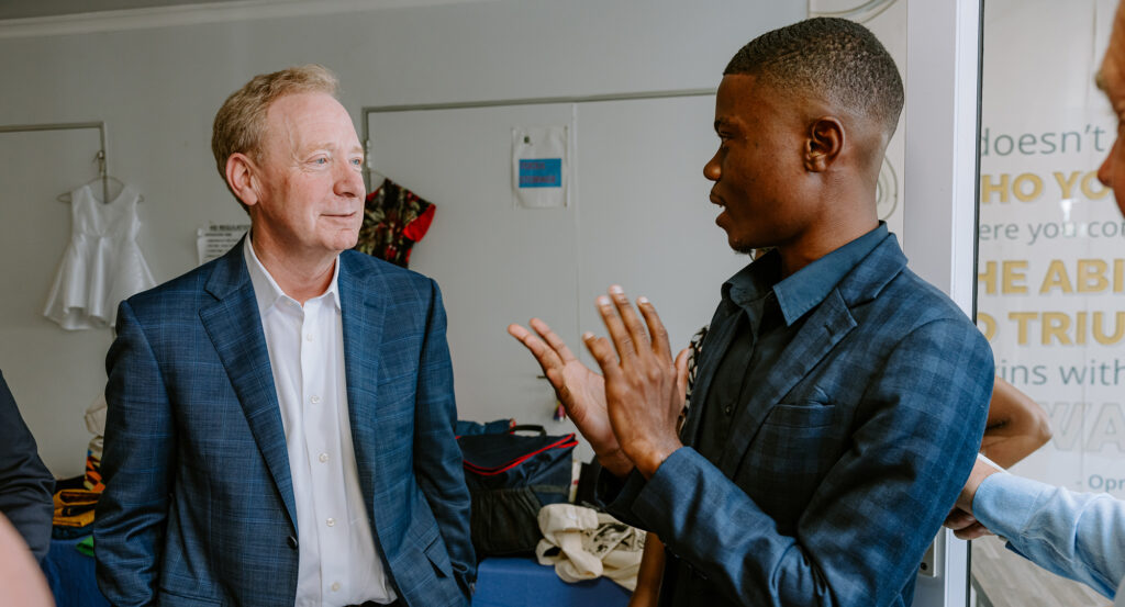 Youth Employment Service programme participant, Banele Mazibuko, sharing his professional success story with Microsoft’s Brad Smith.
